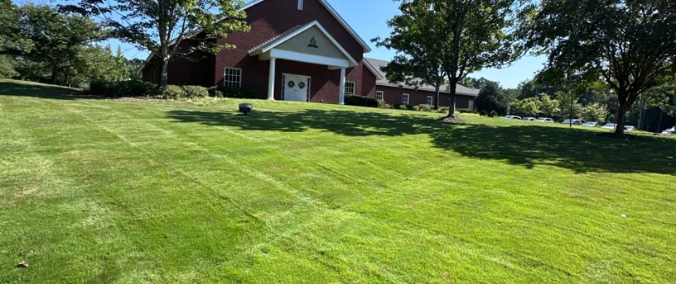 Church in Salem, AL, with a lush, green lawn.